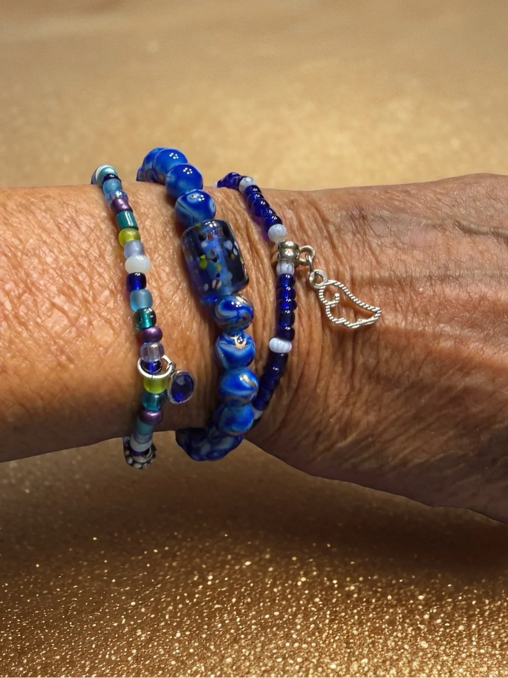 Hand Crafted Blue Glass Bead Trio Bracelet Set with Silver Wing Charm